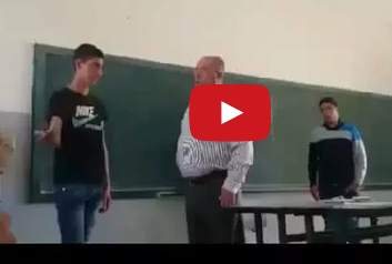 أستاذ يضرب تلامذته !