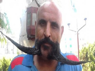 صاحب أطول شنب في مصر : إتعرض علي مليون جنيه كي أحلق شنبي ورفضت صاحب أطول شنب في مصر : إتعرض علي مليون جنيه كي أحلق شنبي ورفضت