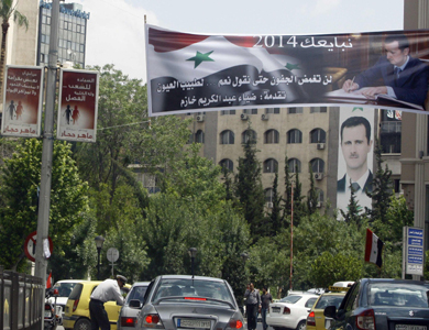 حملة الانتخابات الرئاسية تتحول إلى “مبايعة” للأسد في شوارع دمشق حملة الانتخابات الرئاسية تتحول إلى “مبايعة” للأسد في شوارع دمشق