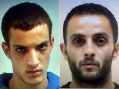 تشييع جثماني منفذي عملية الكنيس اليهودي بعد احتجاز 36 يوما تشييع جثماني منفذي عملية الكنيس اليهودي بعد احتجاز 36 يوما