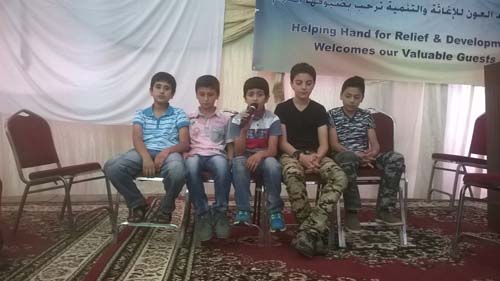 بالصور : حفل افطار لـ 450 طفلا يتيما سوريا واردنيا