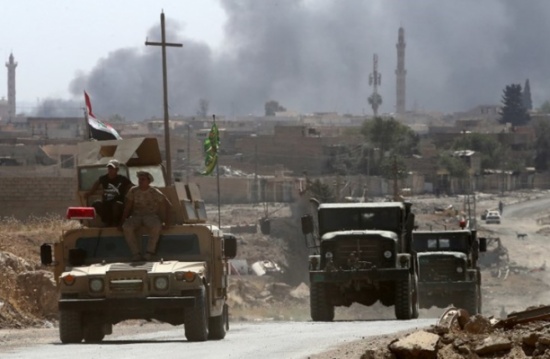 الغارديان: الحشد الشعبي يؤمن الممر الإيراني للبحر المتوسط الغارديان: الحشد الشعبي يؤمن الممر الإيراني للبحر المتوسط