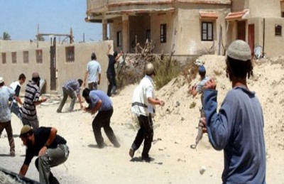 مستوطنون يلقون زجاجات حارقة على منزل بالضفة الغربية