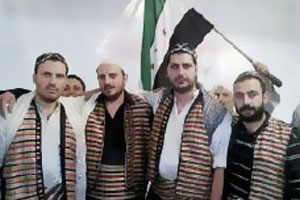 فريق "باب الحارة" يغني في العالم العربي لإسقاط "بشار الأسد"