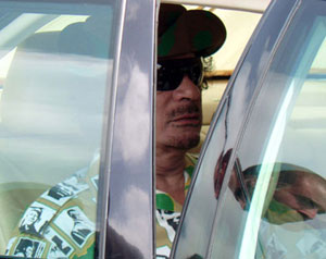 روايات متضاربة  بشأن مكان القذافي  