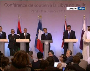مؤتمر باريس يتعهد بدعم ليبيا الجديدة 