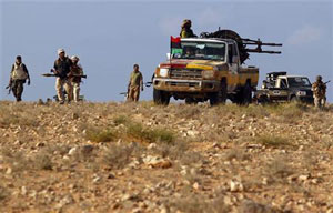 قوات الانتقالي الليبي تقاتل للسيطرة على اخر معاقل القذافي