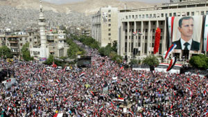 مئات الالاف يخرجون في دمشق دعماً لبرنامج الاصلاح ورفضا للتدخل الخارجي