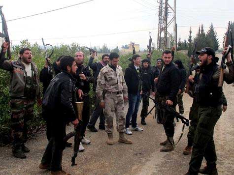 الجيش الحر يسقط مقاتلة ويهاجم بالهاون مبنى أمن الدولة