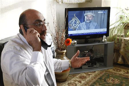 بائع سوري يخوض بمفرده حربا ضد الاسد من مدينة بريطانية بائع سوري يخوض بمفرده حربا ضد الاسد من مدينة بريطانية