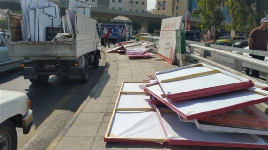 بالصور : ازالة اعلانات المرشحين المخالفة على دوار الداخلية بالصور : ازالة اعلانات المرشحين المخالفة على دوار الداخلية