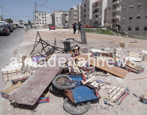 بالصور : الامانة تزيل بسطات شارع الاردن