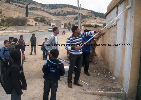 يوم تطوعي لشباب كلنا الاردن الطفيلة في مدرسة فاطمة بنت اليمان