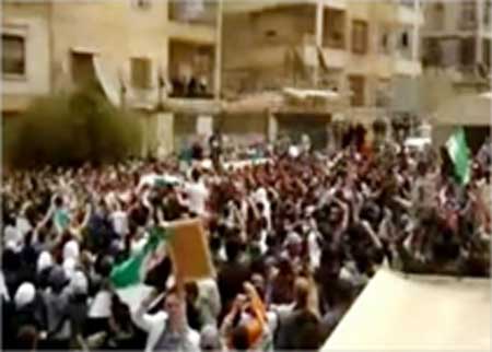 السوريون يتظاهرون بجمعة "سننتصر ويهزم الأسد" 