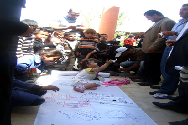 تنظيم يوم مفتوح في معان حول تحسين ورعاية الطفولة