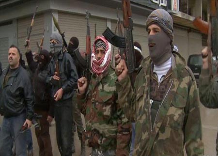 نشطاء سوريون: تكبيد قوات الأسد خسائر كبيرة بالرستن