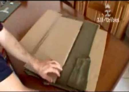 اختراع  لطي الملابس