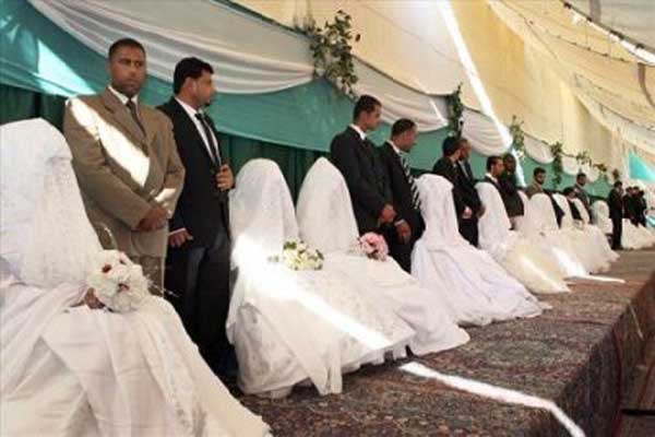 حفل زفاف جماعي بمشاركة (46) عريسا وعروسا ( صور ) حفل زفاف جماعي بمشاركة (46) عريسا وعروسا ( صور )