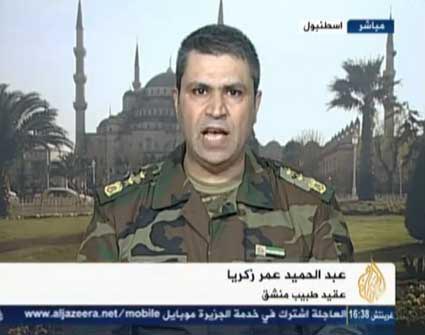 عقيد منشق يكشف عن توزيع واقيات من الأسلحة الكيماوية على جنود ماهر الأسد في الفرقة الرابعة ( فيديو ) عقيد منشق يكشف عن توزيع واقيات من الأسلحة الكيماوية على جنود ماهر الأسد في الفرقة الرابعة ( فيديو )