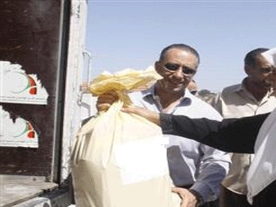 توزيع طرود خير ومساعدات غذاء وكساء وكوبون الخبز الخيري توزيع طرود خير ومساعدات غذاء وكساء وكوبون الخبز الخيري