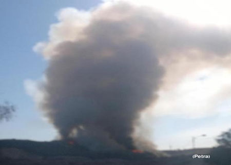 مواطنون يعانون من حريق في مكب الاكيدر 