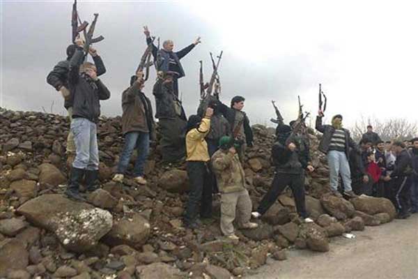 أتراك ينضمون لكتائب تركمانية لمساعدة الجيش الحر من هجمات الأسد