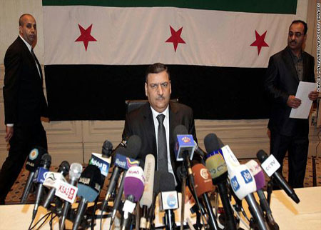 أمريكا ترفع العقوبات عن حجاب بعد انشقاقه عن الأسد