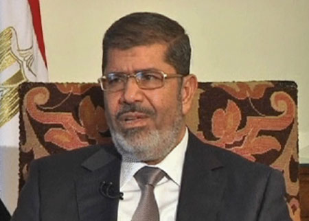 الرئيس المصري يدعو الى رحيل الأسد واجتماع لمعارضة الداخل في دمشق
