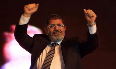 مرسي يخاطب الأسد: لن يدوم وجودكم طويلا مرسي يخاطب الأسد: لن يدوم وجودكم طويلا