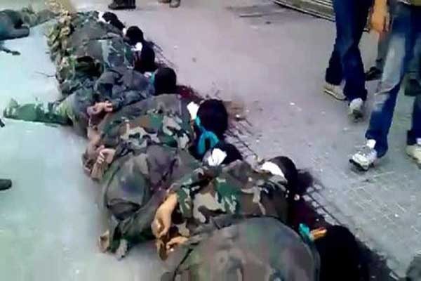 معارضون مسلحون يعدمون اكثر من 20 عسكريا سوريا في حلب 