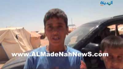 توزيع كسوة الشتاء والعيد على اللاجئين السوريين بالزعتري 