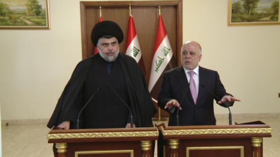 العبادي يرفض طلب مقتدى الصدر "حل" الحشد الشعبي