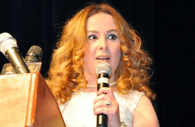 انتقادات واسعة لحنان شوقي بسبب ملابسها في العراق