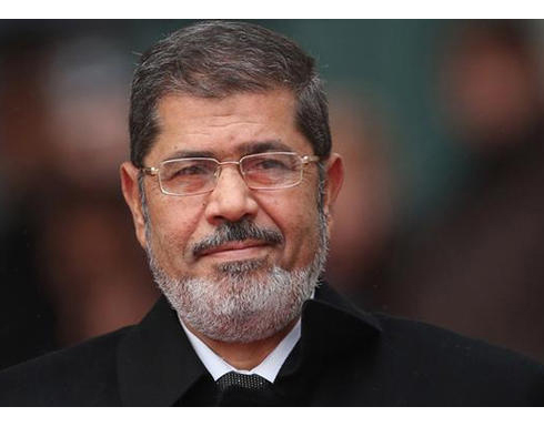 مرسي إلى الجنايات بتهمة تسريب مستندات لقطر مرسي إلى الجنايات بتهمة تسريب مستندات لقطر