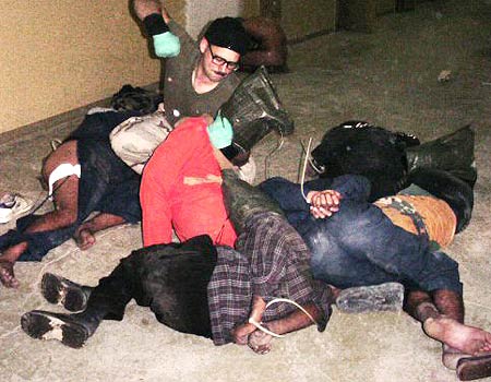 تمزيق نسخة من القرأن الكريم تفجر "انتفاضة" في سجن ابو غريب 