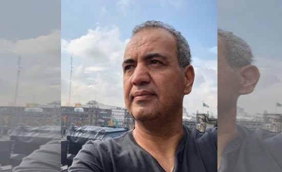 توقيف رسام الكاريكاتير عماد حجاج 14 يوما