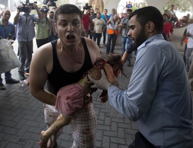 استشهاد 40 فلسطينيا في مجزرة اسرائيلية جديدة على حي الشجاعية فجر الأحد