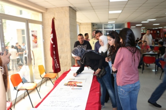جامعة الشرق الأوسط توقع على وثيقة " لا تقتلني بفرحك "