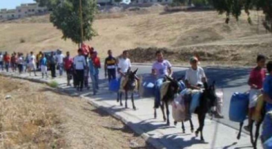 بالصور / في الكرك : مسيرة على الدواب احتجاجاً على رفع المحروقات