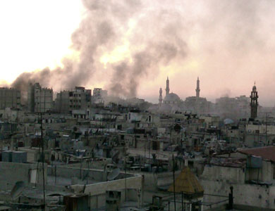 انفجاران عنيفان بمخيم اليرموك واشتباكات في حمص