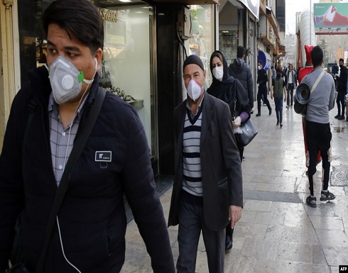 "مادة بيضاء لإخفاء رائحة الموت".. صور أقمار صناعية ترصد مقابر ضحايا كورونا في إيران