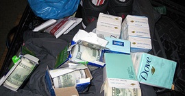 نيويورك: ضبط سوداني يخفي نصف مليون دولار في علب صابون