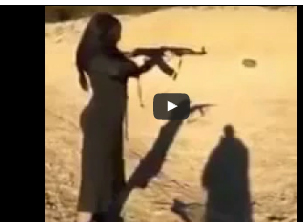 شاهد..  فتاة عربية تطلق النيران من سلاح آلي مرتدية ملابس سهرة