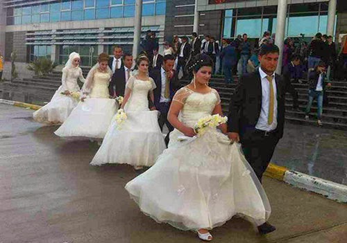 بالصور: كردستان تقيم عرساً جماعياً لـ 120 لاجئاً سورياً