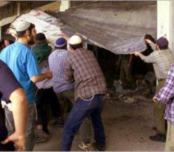 مستوطنون يحاولون الإستيلاء على حي في بير زيت 