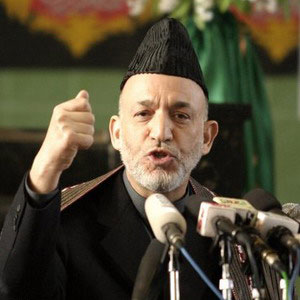 كرزاي يهدد بالانضمام لطالبان 