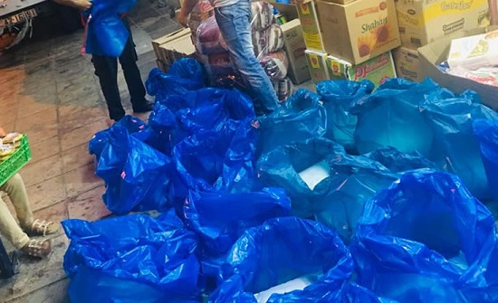 توزيع طرود خير على أسر معوزة بالمزار الجنوبي