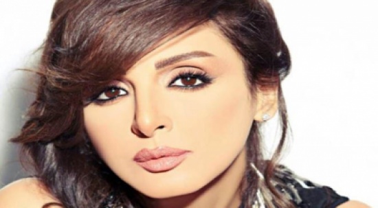 أنغام تنهي الخلافات مع والدها ( صورة)
