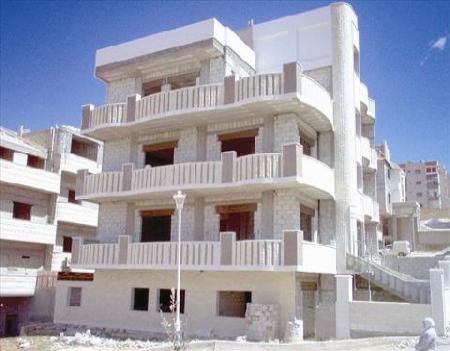 مستثمرو الاسكان بإربد يحتجون على رفع ضريبة الدخل