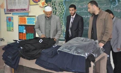 توزيع كسوة الشتاء بمدرسة حنينا